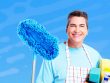 Smiling Male Cleaner with mop and cleaning equipments